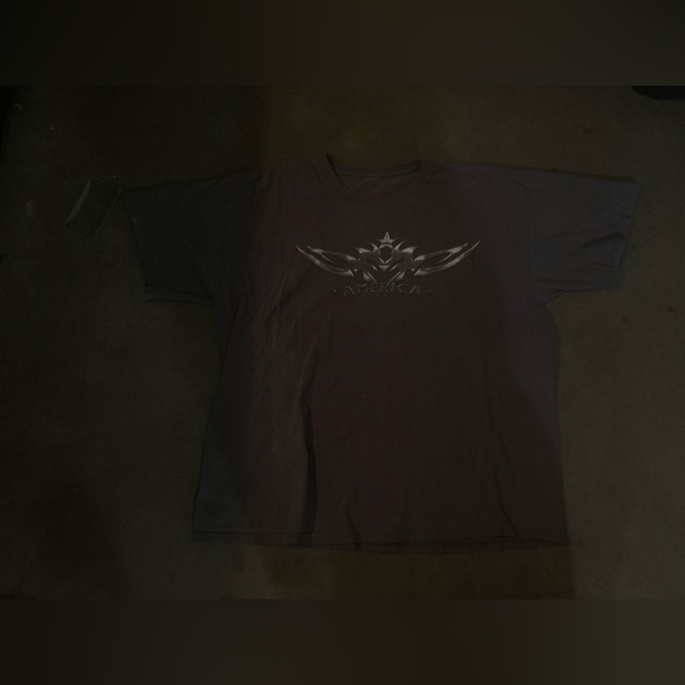 Grey shirt, not sure of the brand